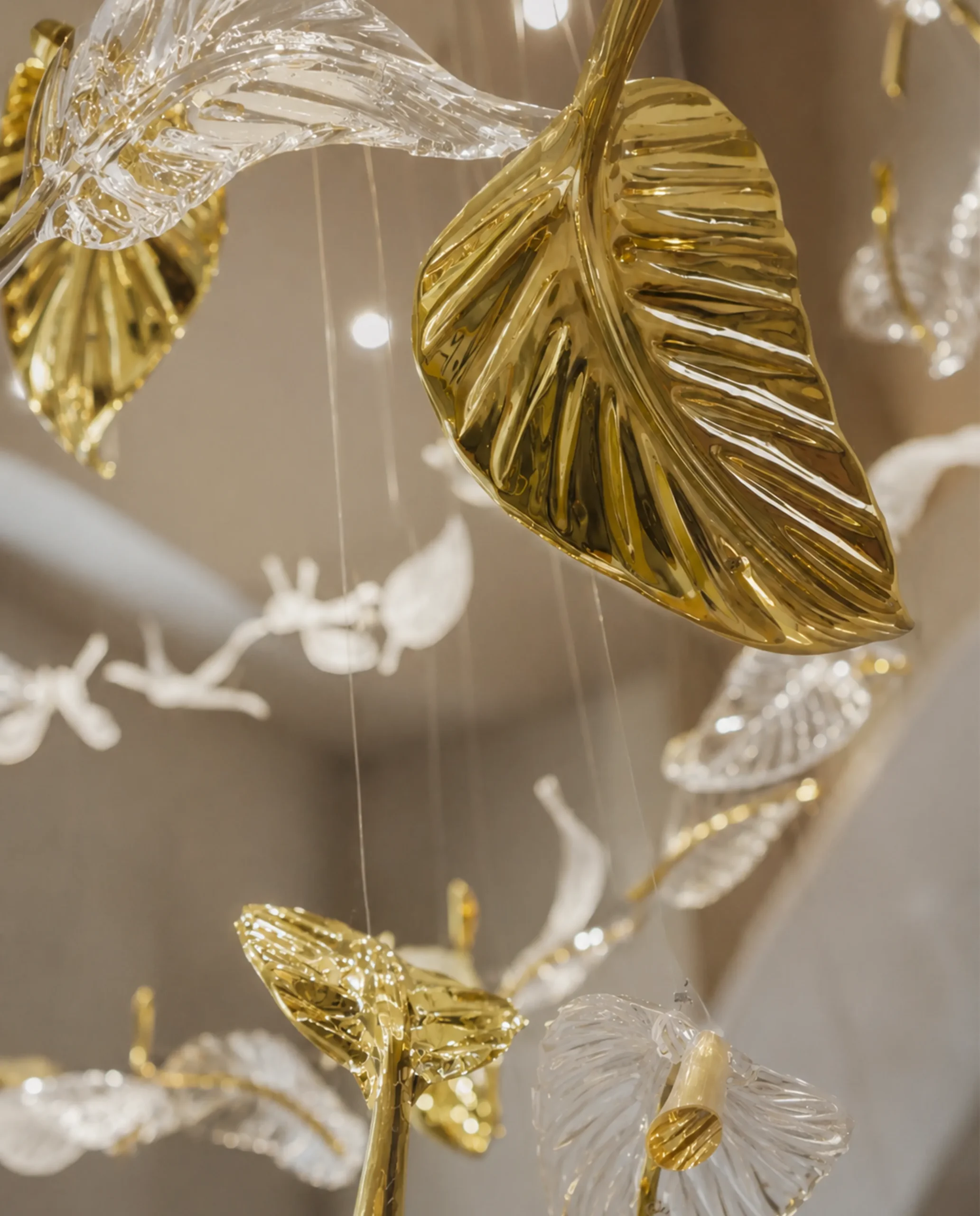 Amara chandelier gold leaf suspension detail
