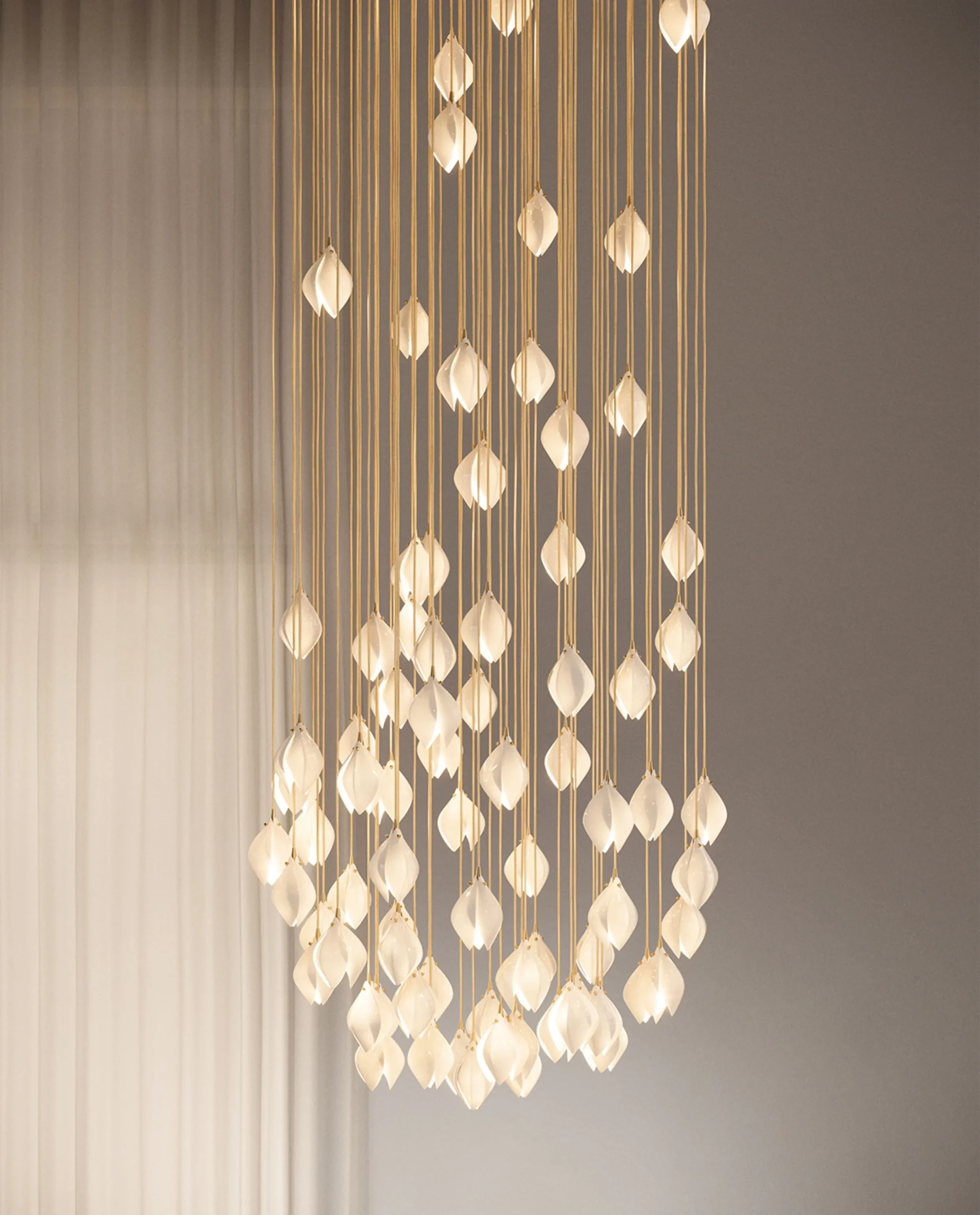 Fia chandelier scandent composition cascading in luxury interior