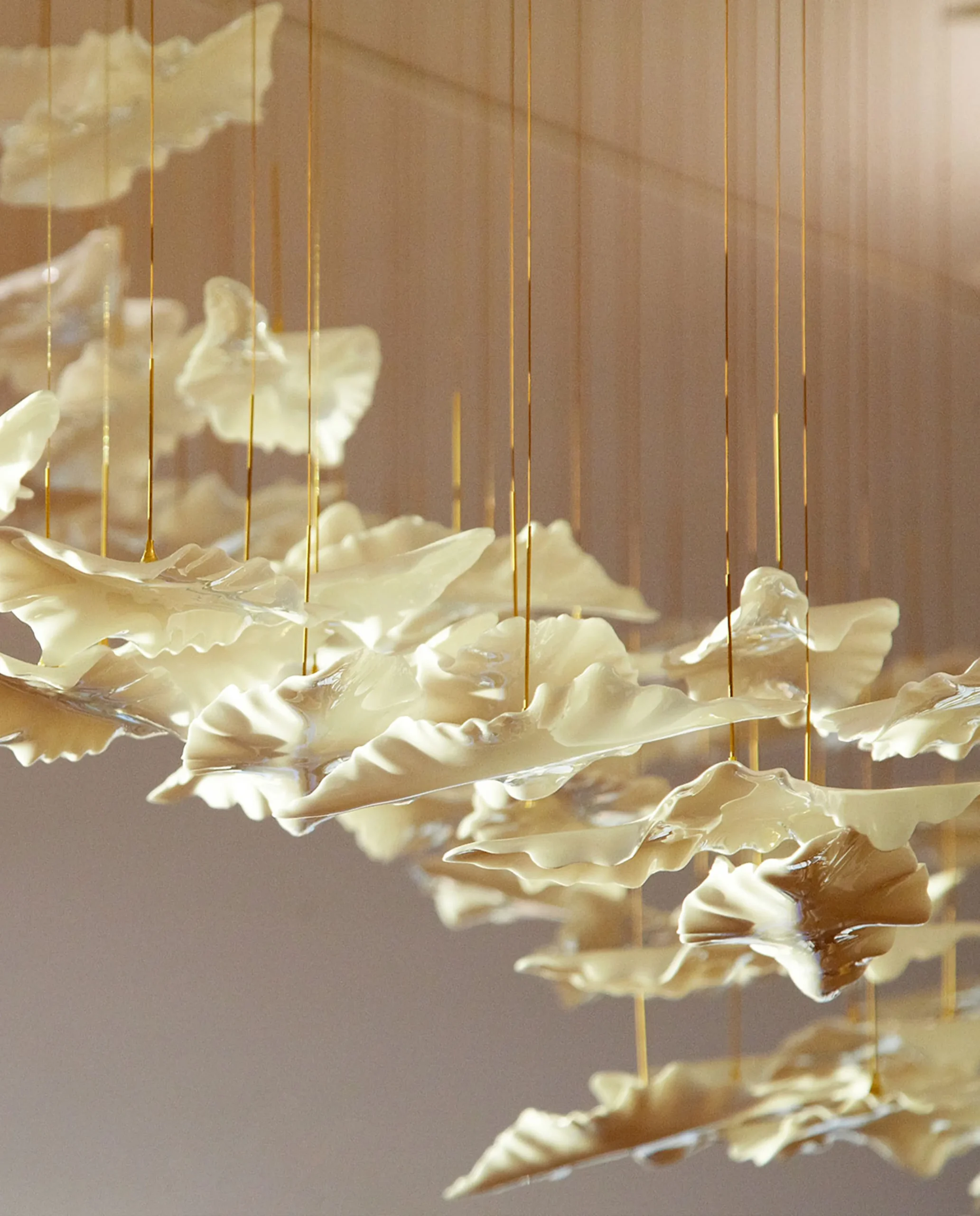 Folli chandelier gold and white leaf close-up Bloom Lighting