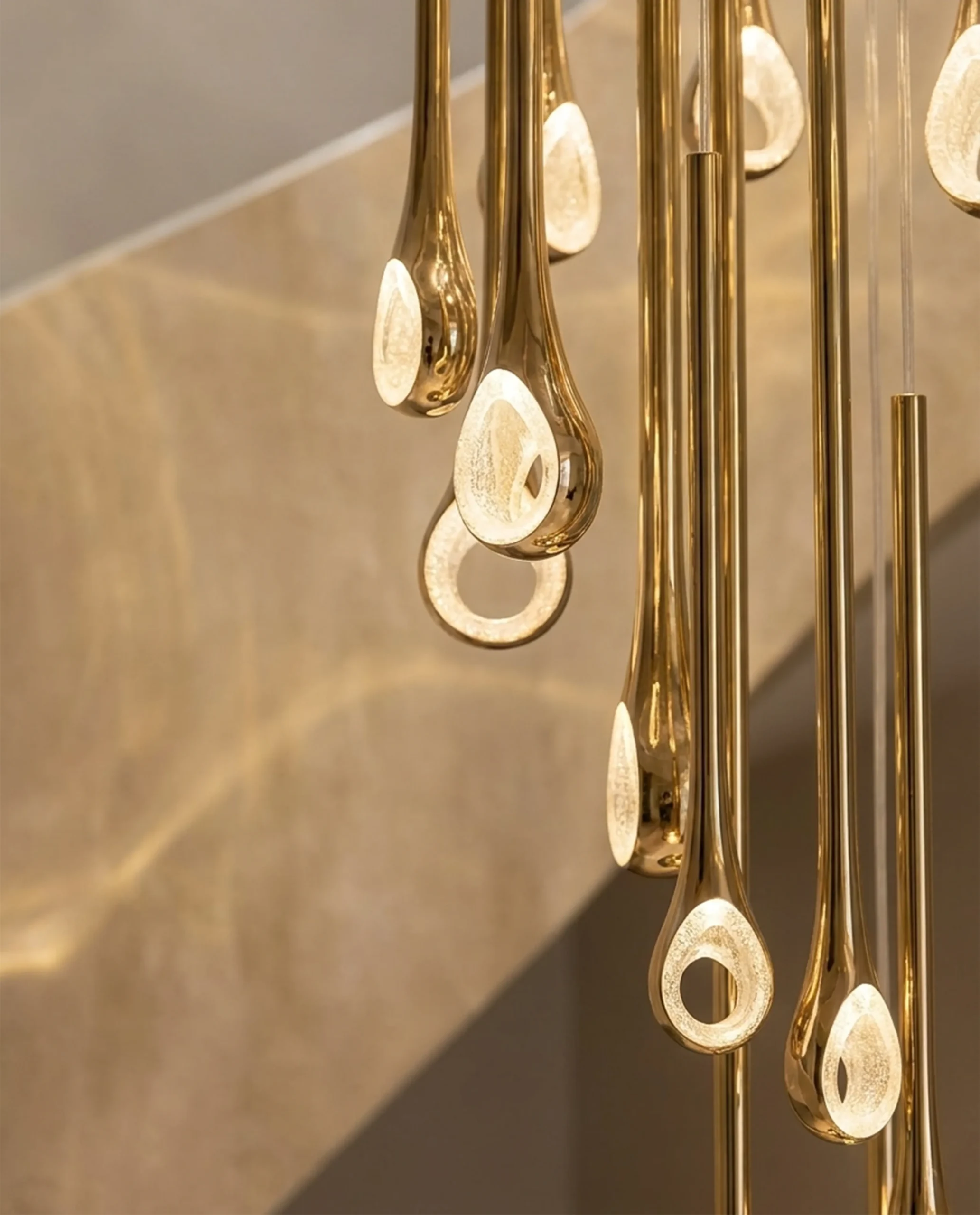 Gazelle chandelier gold rod close-up Bloom Lighting