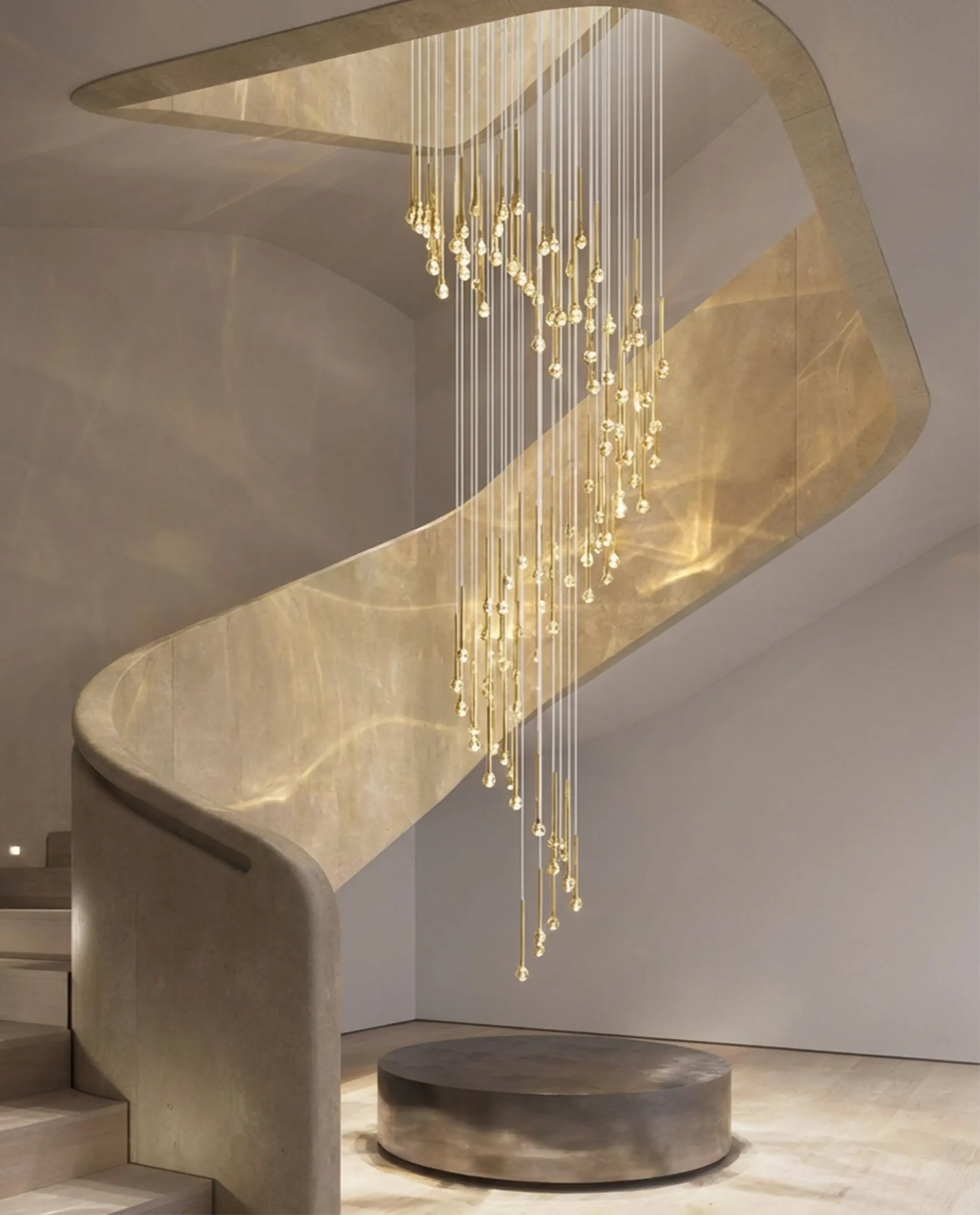 Gazelle chandelier cascading gold rods in luxury stairwell