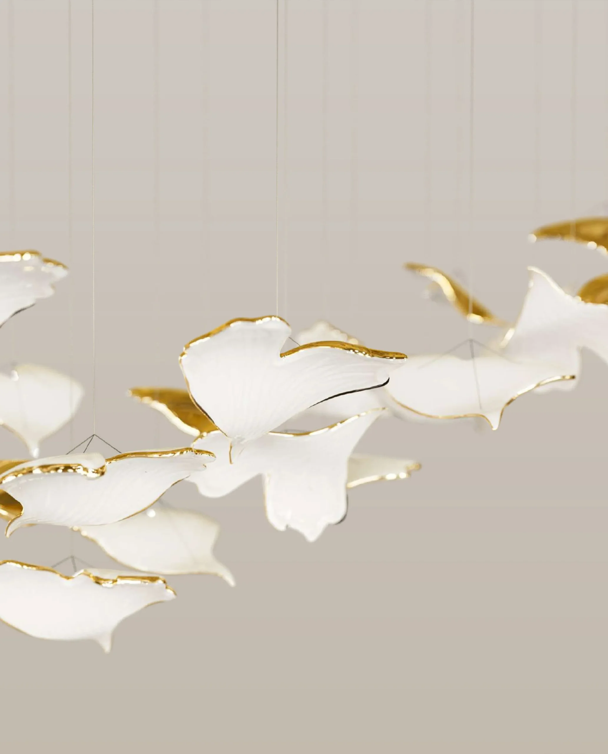 Irene chandelier gold and white Ginkgo leaf close-up Bloom Lighting