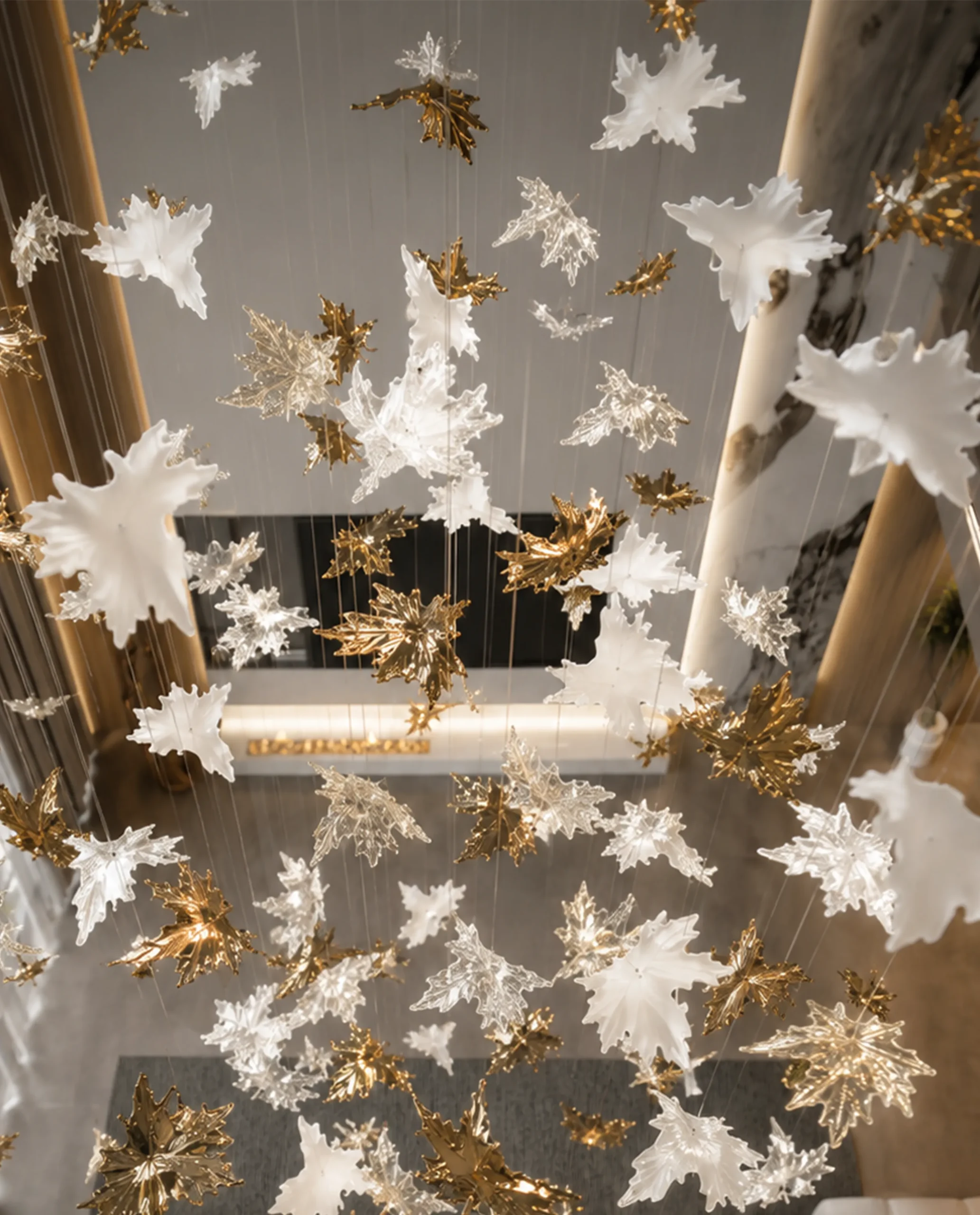 Lianna chandelier gold and white leaf formation close-up