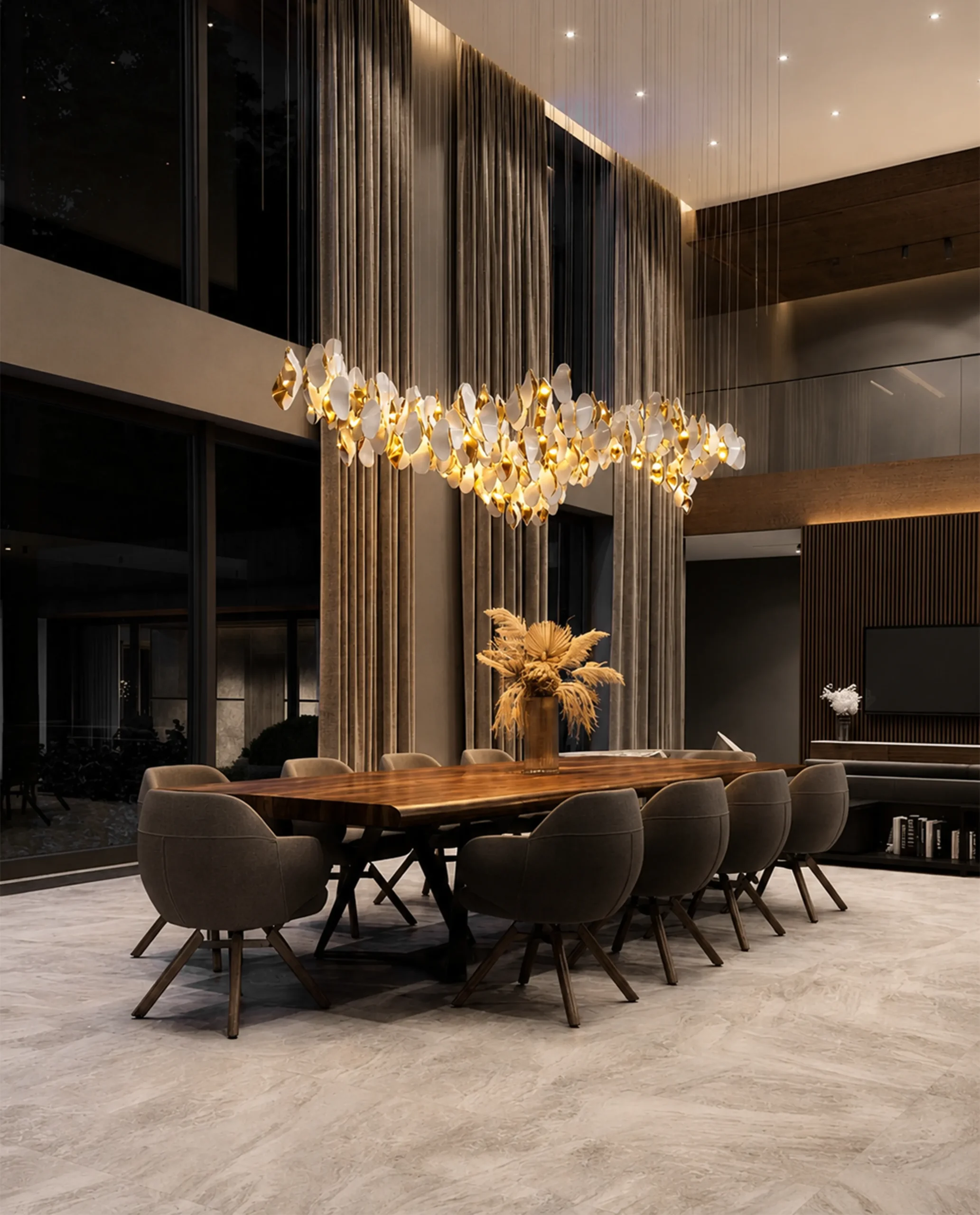 Ornella chandelier suspended above dining table in luxury interior