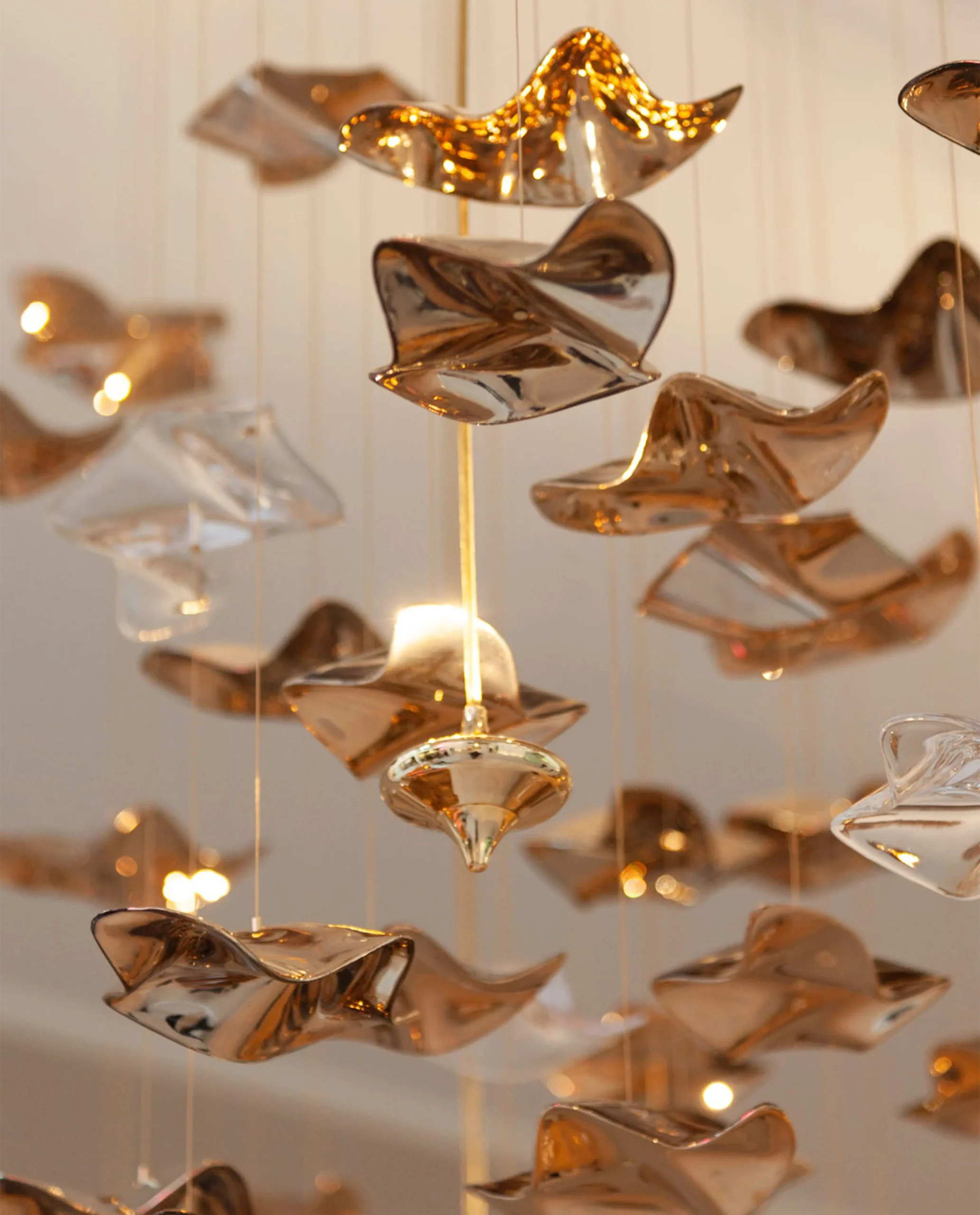 Sandhills mixed gold and rose gold wave suspension