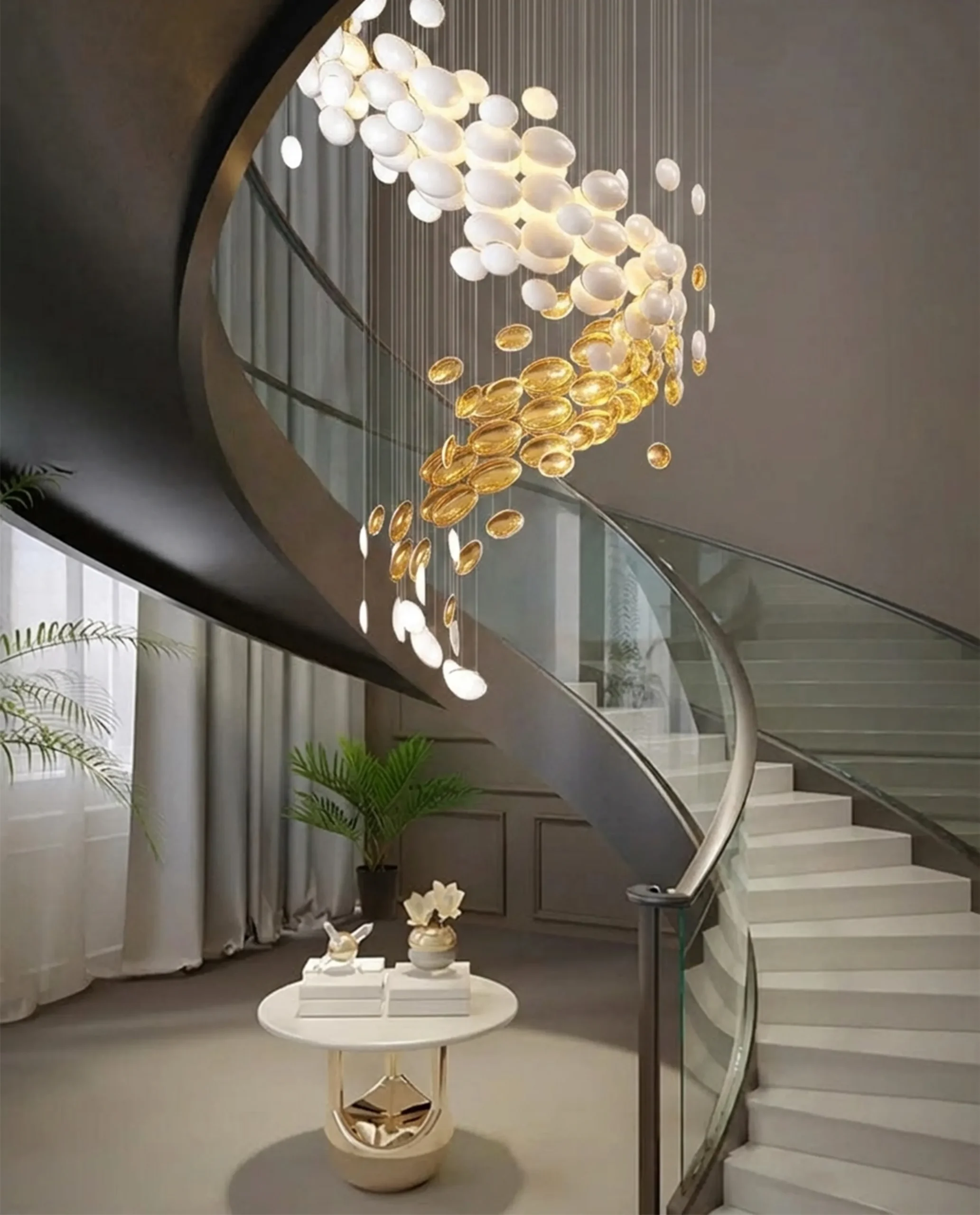 Zarre chandelier cascading bowl formation in stairwell
